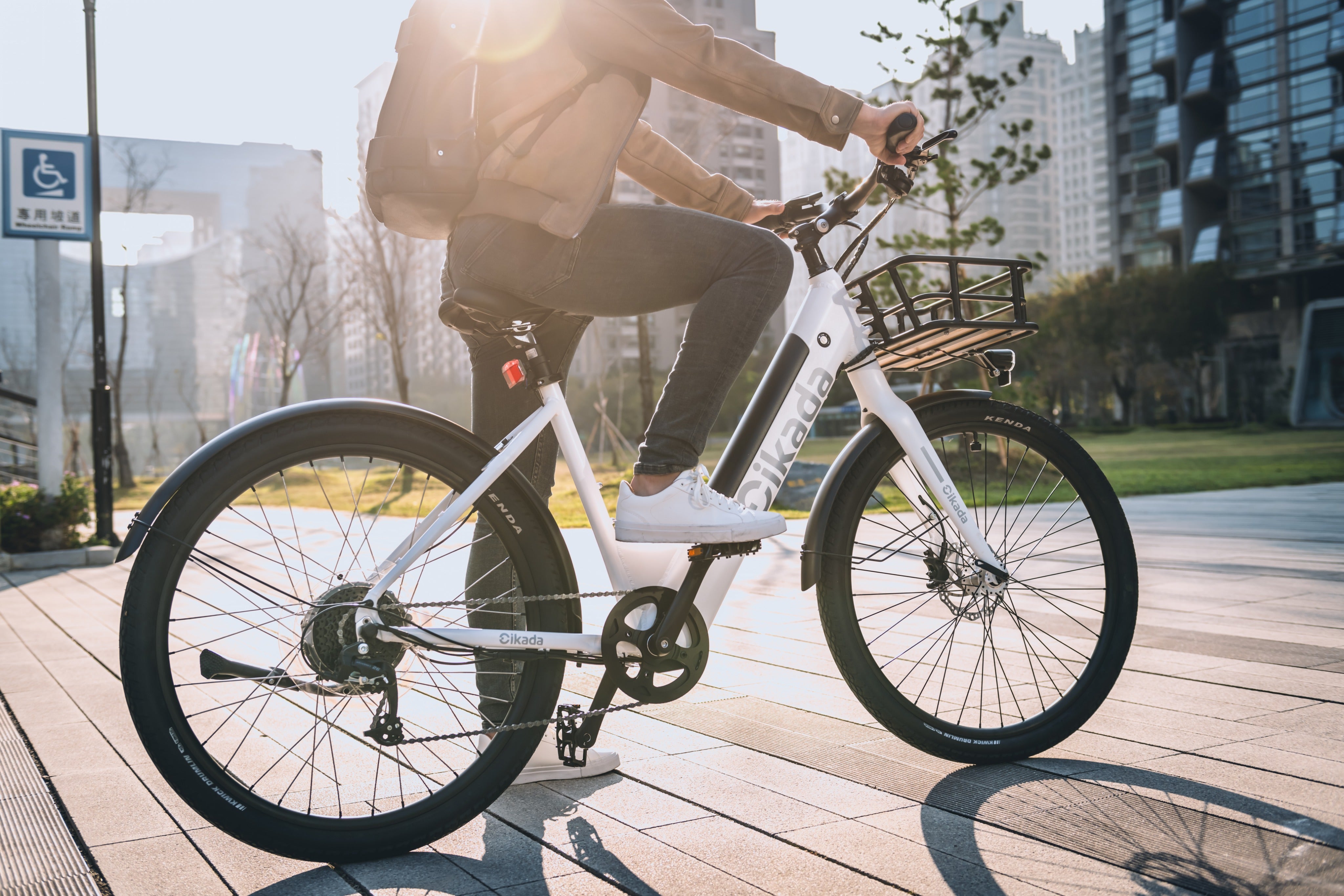 A man is about to start riding his Cikada City e-bike.