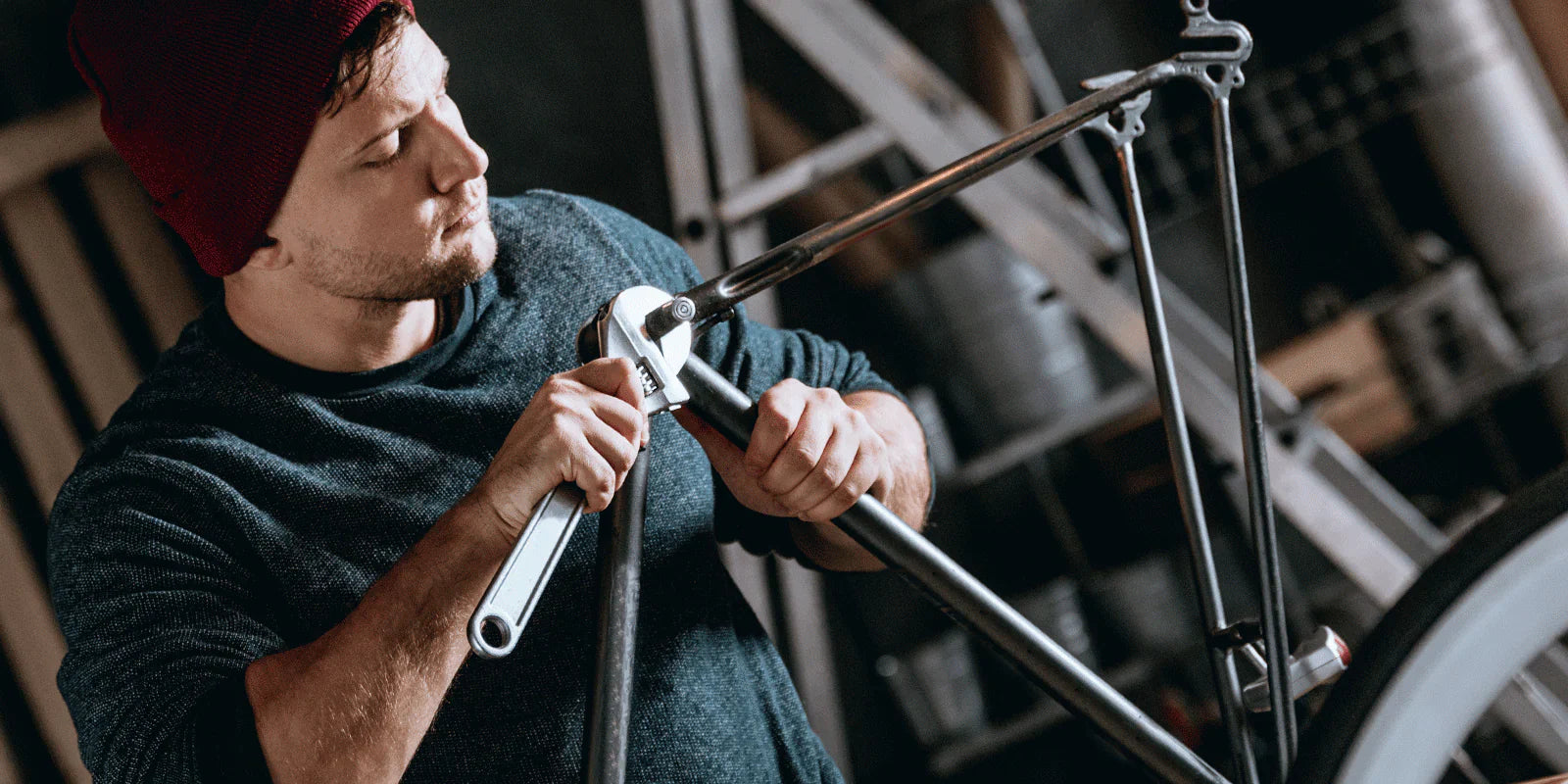 man fixing bike